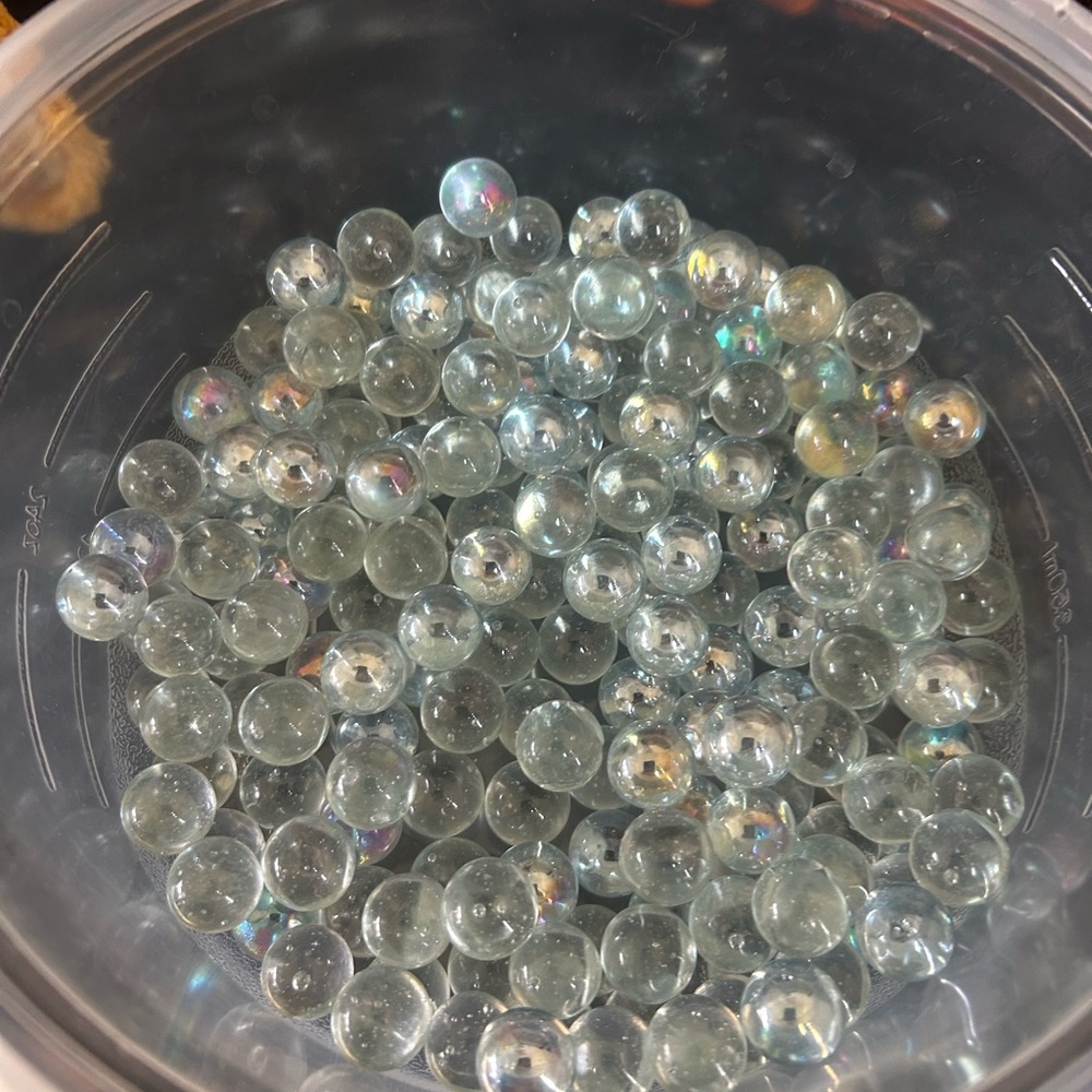 Lot (100) Clear Glass Marbles with Iridescent Finish